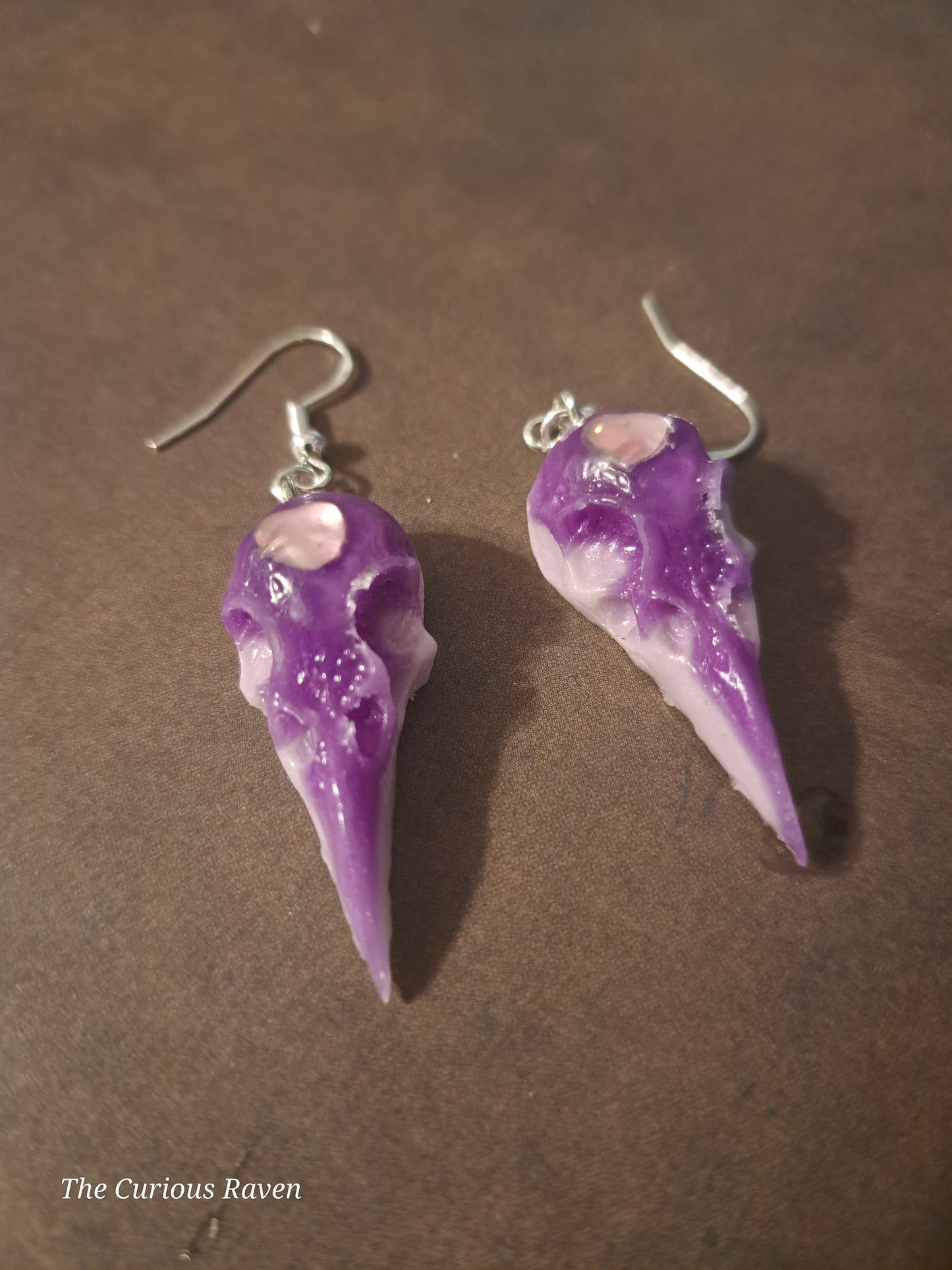 Lavender Glow in the Dark Raven Skull Earrings