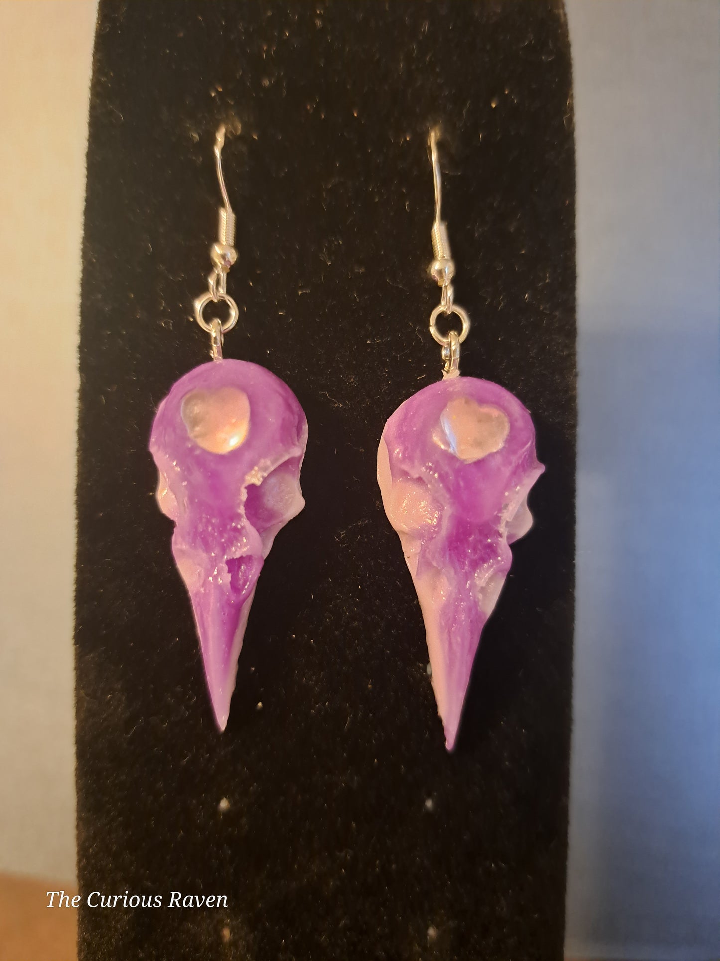 Lavender Glow in the Dark Raven Skull Earrings