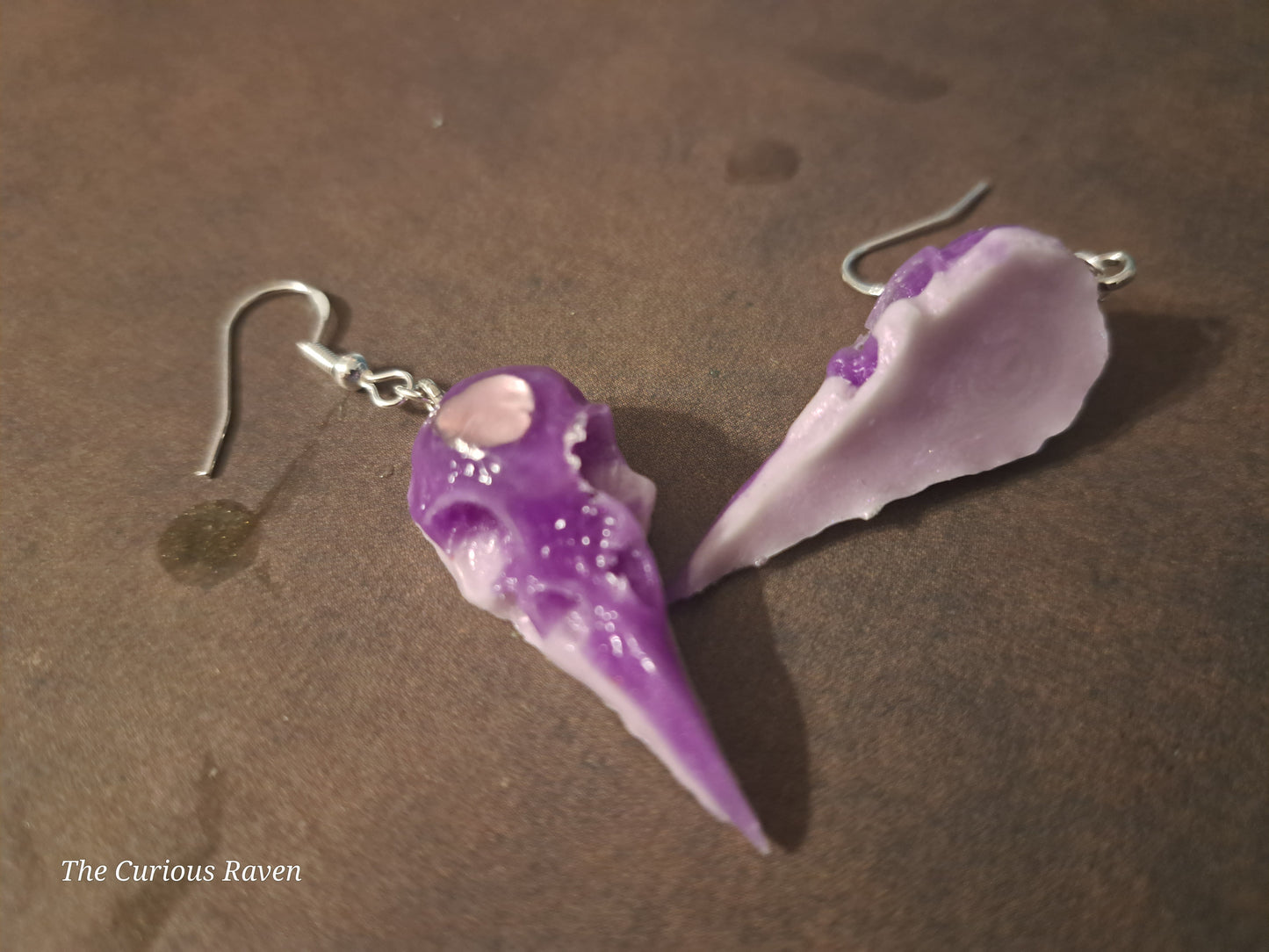 Lavender Glow in the Dark Raven Skull Earrings