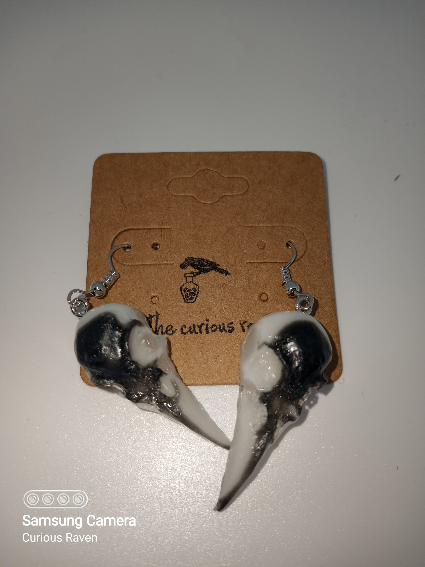 Raven skull earrings