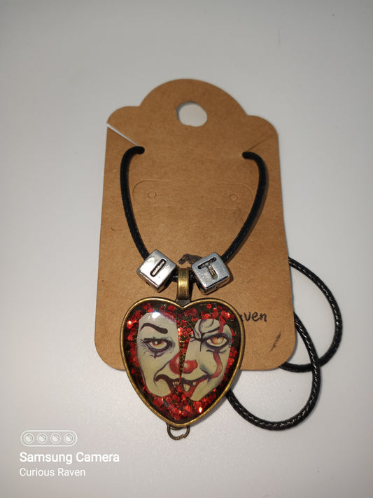 Pennywise resin heart necklace