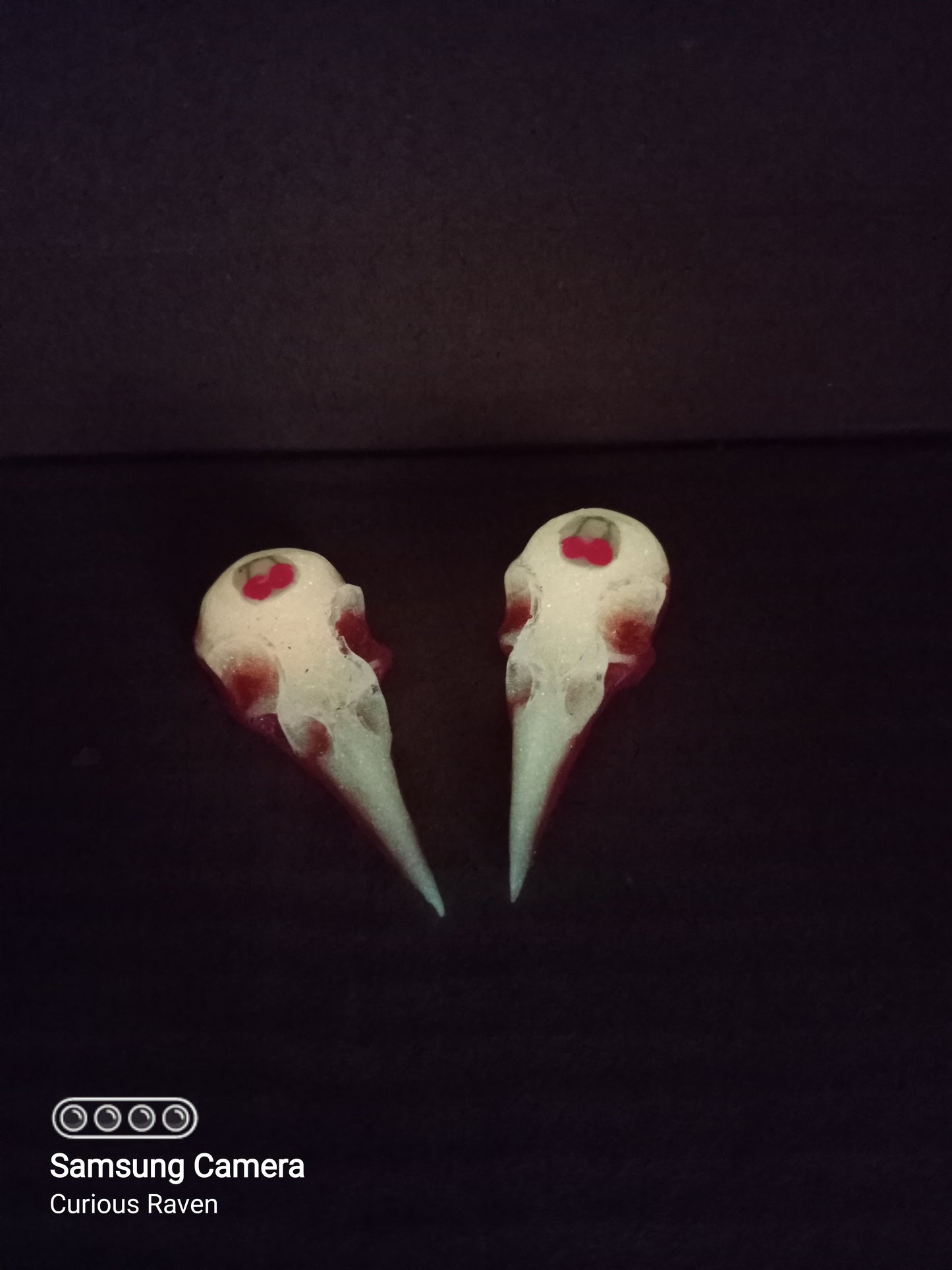 Cherry Glow in the Dark Raven Skull Shell Casing Earrings