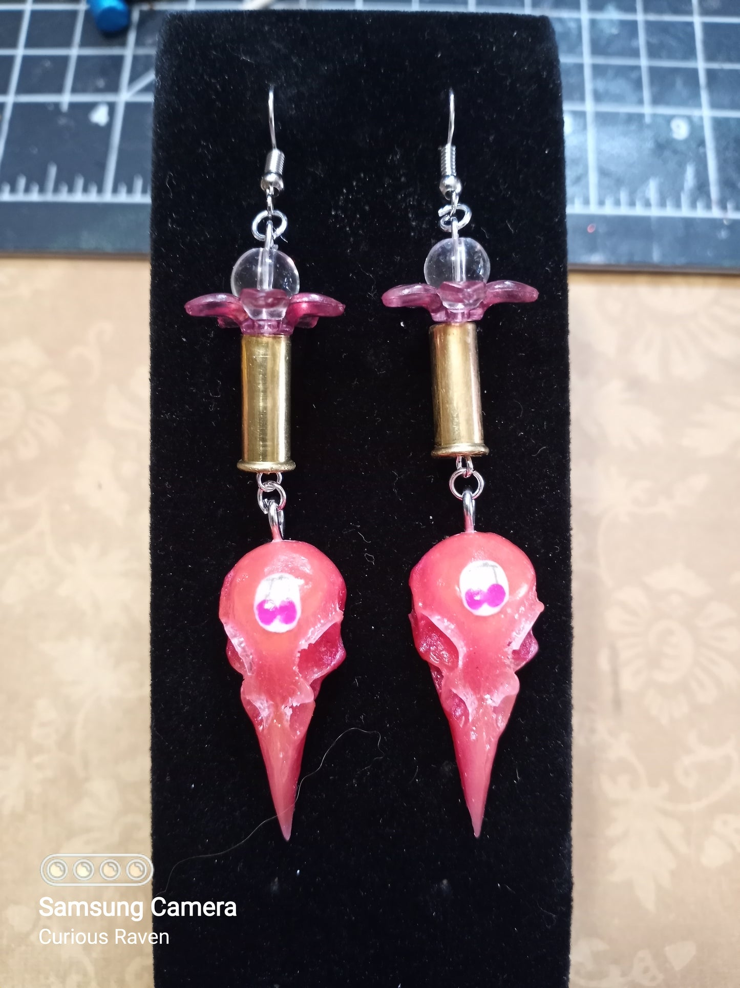 Cherry Glow in the Dark Raven Skull Shell Casing Earrings