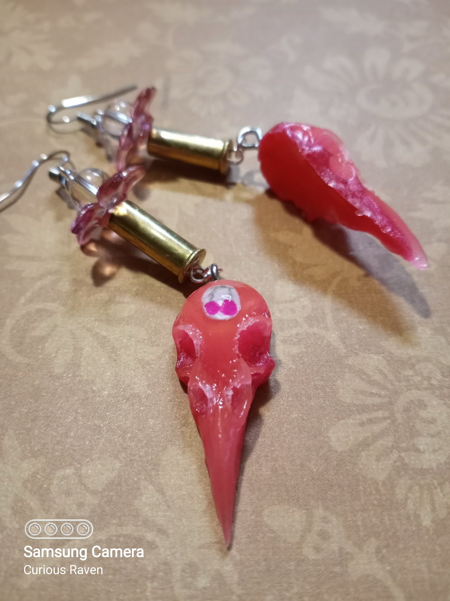 Cherry Glow in the Dark Raven Skull Shell Casing Earrings