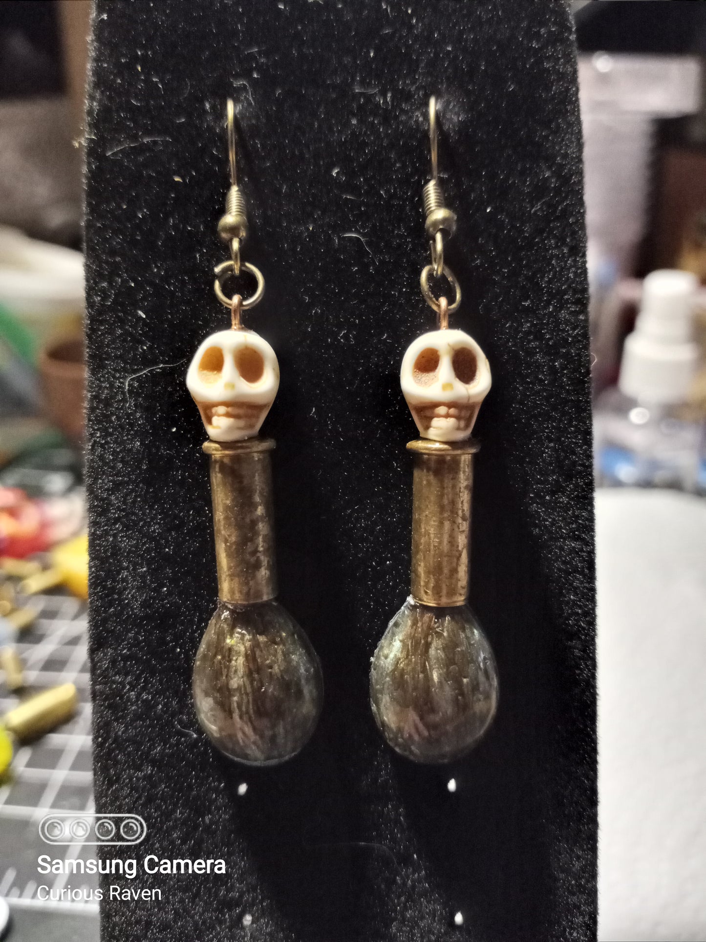 Venom Drip Skull and Shell Casing Earrings