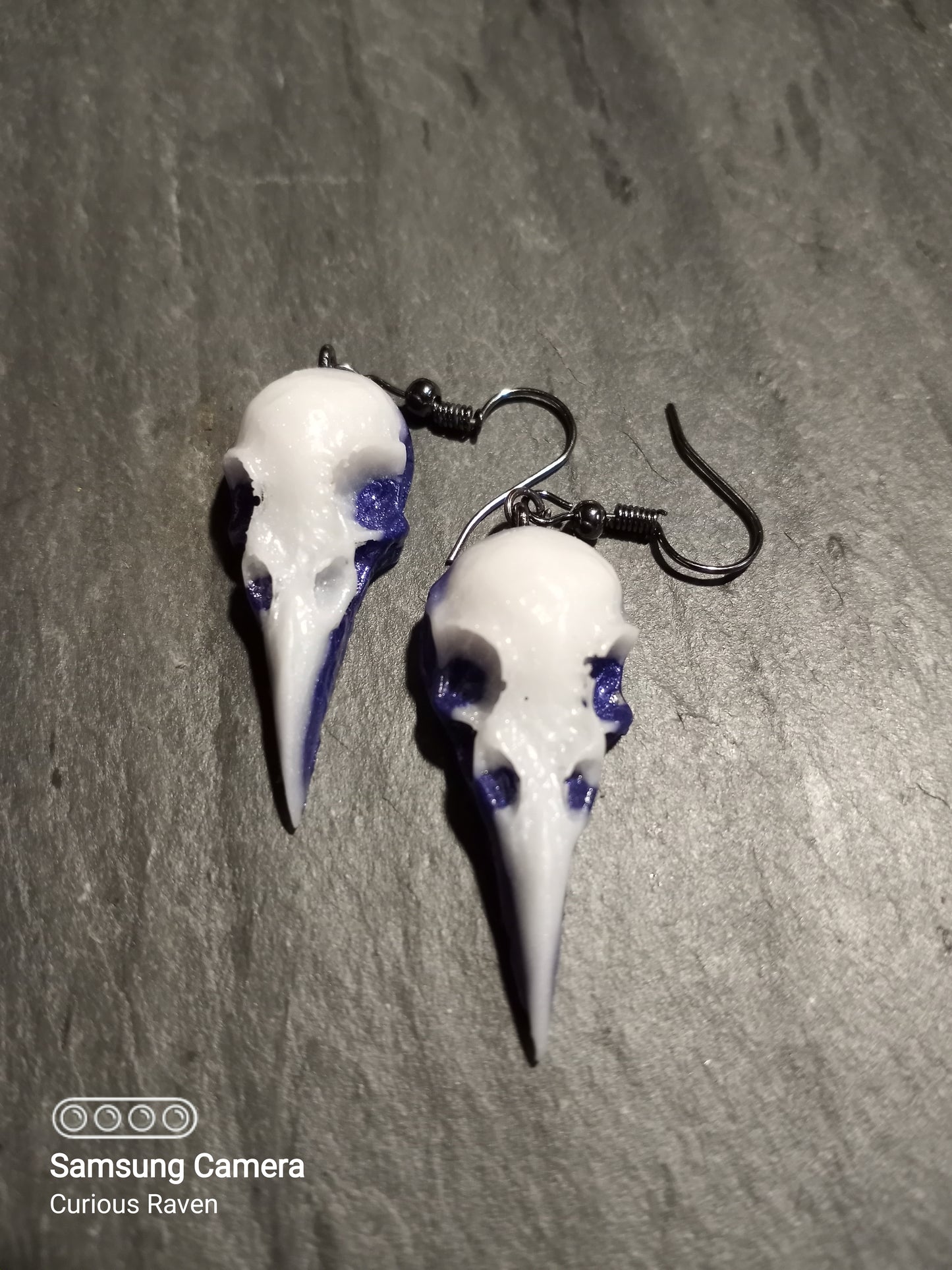 Royal Purple Glow in the Dark Raven Skull Earrings