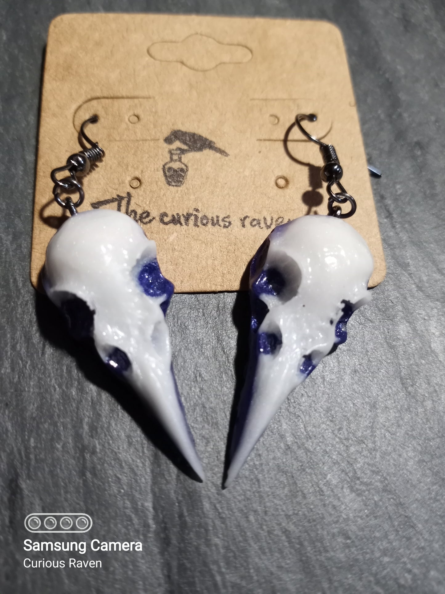 Royal Purple Glow in the Dark Raven Skull Earrings